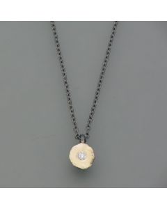 Blackened necklace with diamond, patina