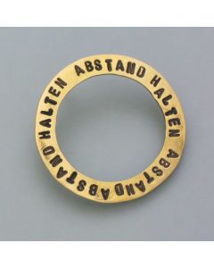 Keep the brass pin at a distance