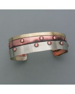 Bangle made of three metals