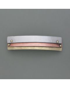 Hair clip of three metals, across