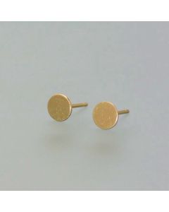 Delicate gold ear studs, platelets