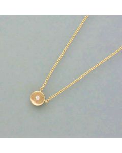 Delicate gold necklace with a small diamond pendant
