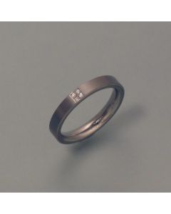 Titanium ring with four diamonds