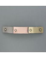 Hair clip made of three metals