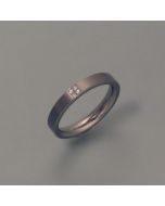 Titanium ring with four diamonds