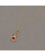 Elegant Gilded Necklace with Garnet Pendant