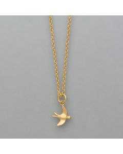 small pendant swallow made of gold plated silver