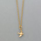 small pendant swallow made of gold plated silver