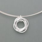 Small pendant playful rings made of silver