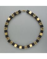 Chain with cubes of ebony and brass