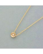 Delicate gold necklace with a small diamond pendant