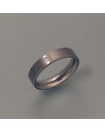 Titanium ring with cut diamond