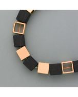 Chain with cubes of ebony and bronze