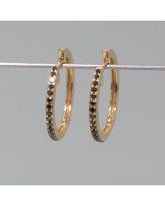 Yellow gold hoops with black diamonds