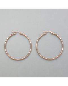 Large hoop earrings rosé look