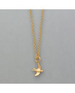 small pendant swallow made of gold plated silver