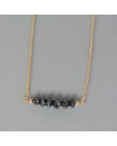 delicate necklace of gold with black diamonds, large