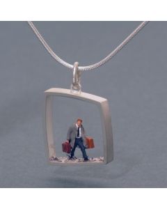 “Man with Suitcases” Silver Pendant