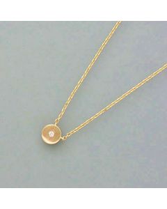 Delicate gold necklace with a small diamond pendant