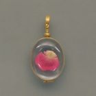 Oval-shaped glass locket, gold-plated