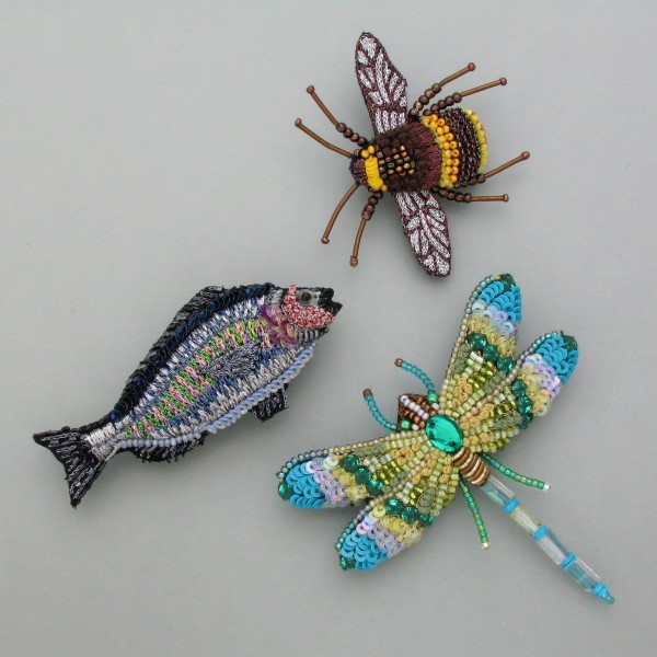 extravagant colorful brooches